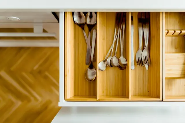 Kitchen drawer with a wooden cutlery organizer